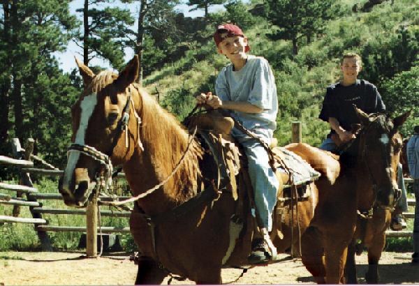Scotty and Lee on Horseback in Wyoming